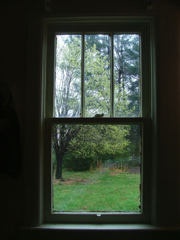 cracked bedroom window, taped our fix may not be classy, but the view is